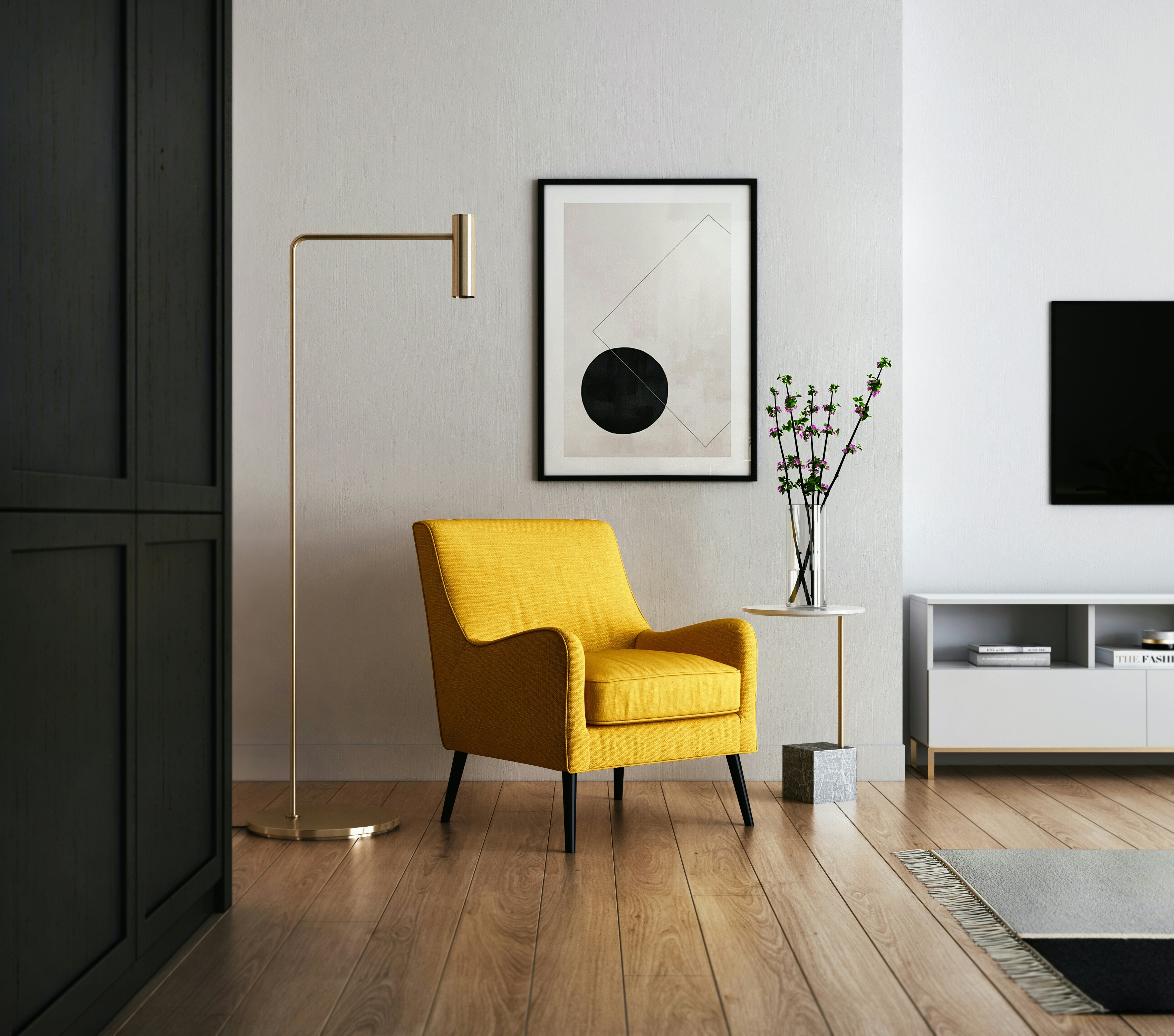 A yellow chair under a lamp in the corner of a room.